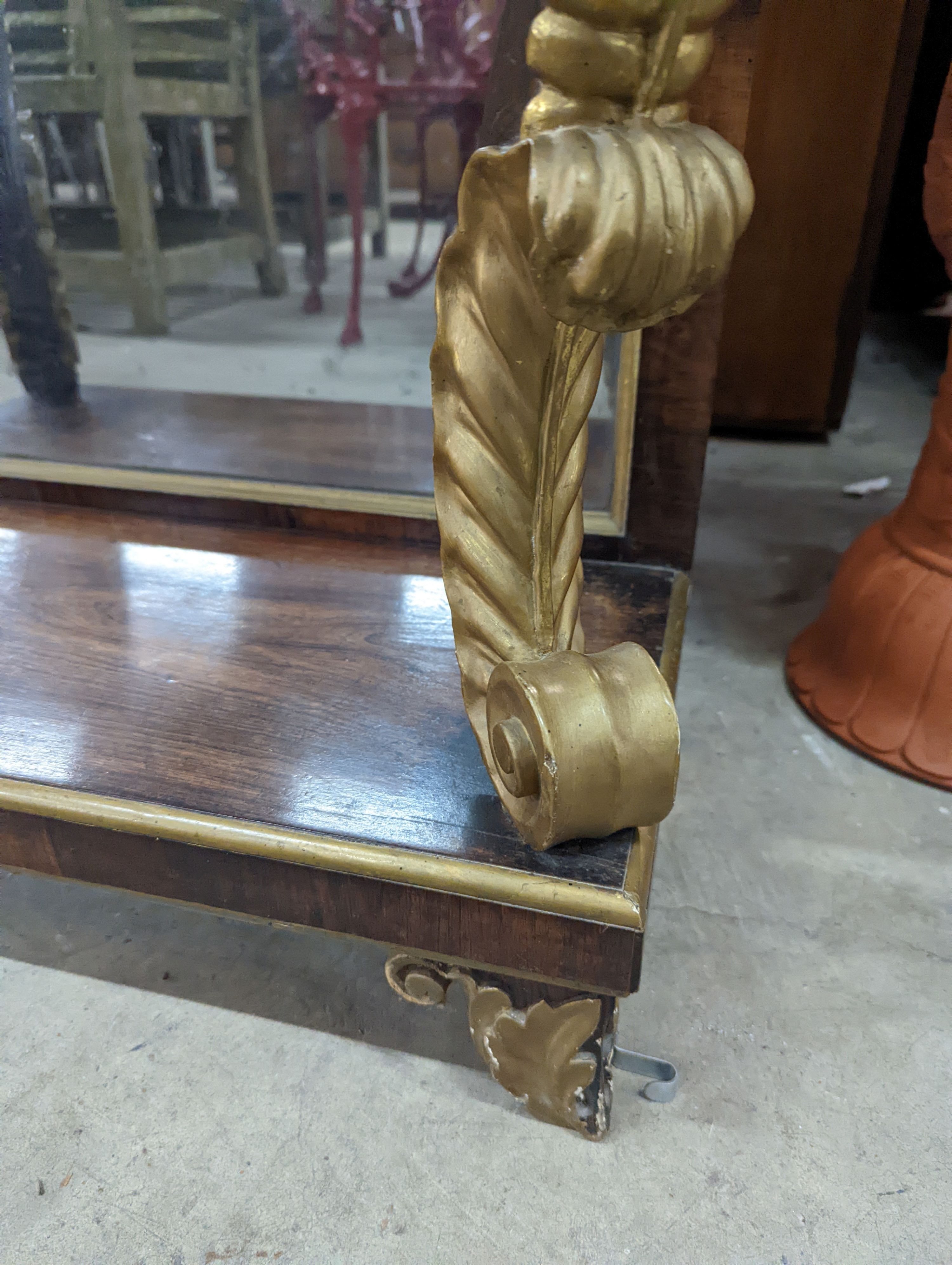 A Regency rosewood and parcel gilt marble topped console table, width 74cm, depth 36cm, height 82cm